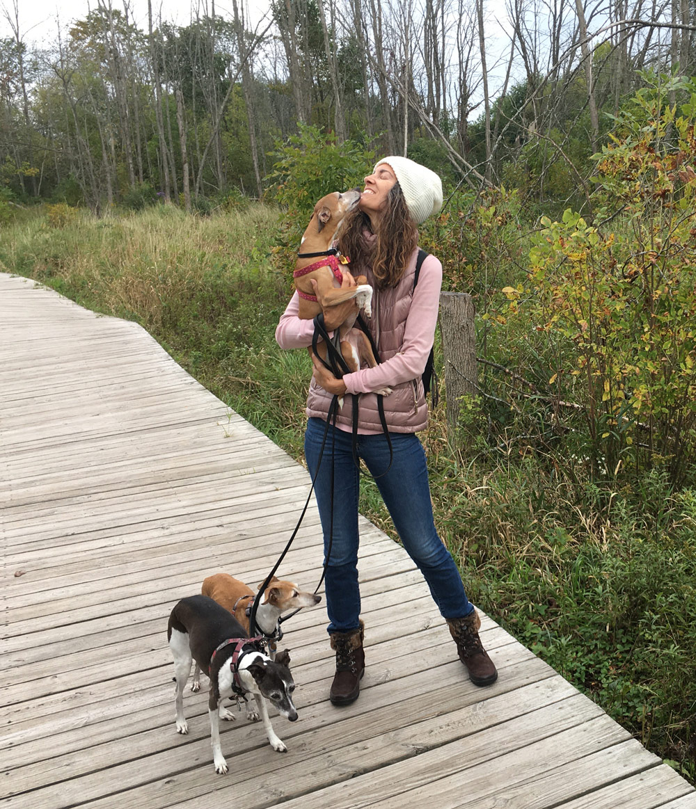 Airbnb host Maria with Coco and Ginger dogs