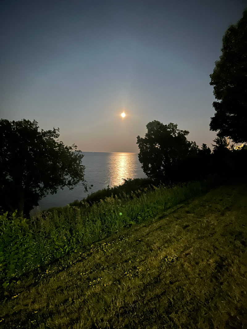 Effulgent moon over Lake Michigan